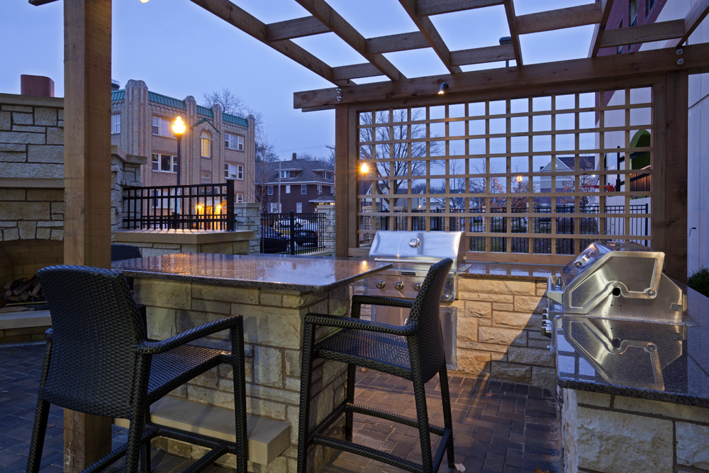 Outdoor seating area with grills at the Homewood Suites in Rochester, MN