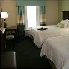 Bedroom in the Hampton Inn & Suites in Shakopee, MN