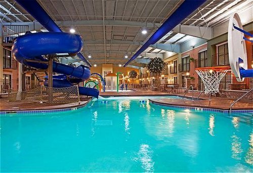 Pool area with a slide in the Holiday Inn in Lakeville, MN