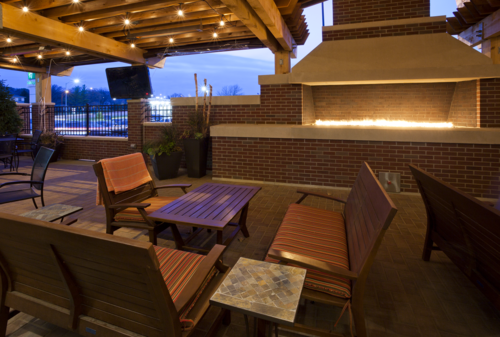 Seating area by fireplace at the Green Mill in New Ulm, MN