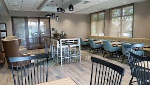 Breakfast seating area in the Hampton Inn Hometown in Spicer, MN