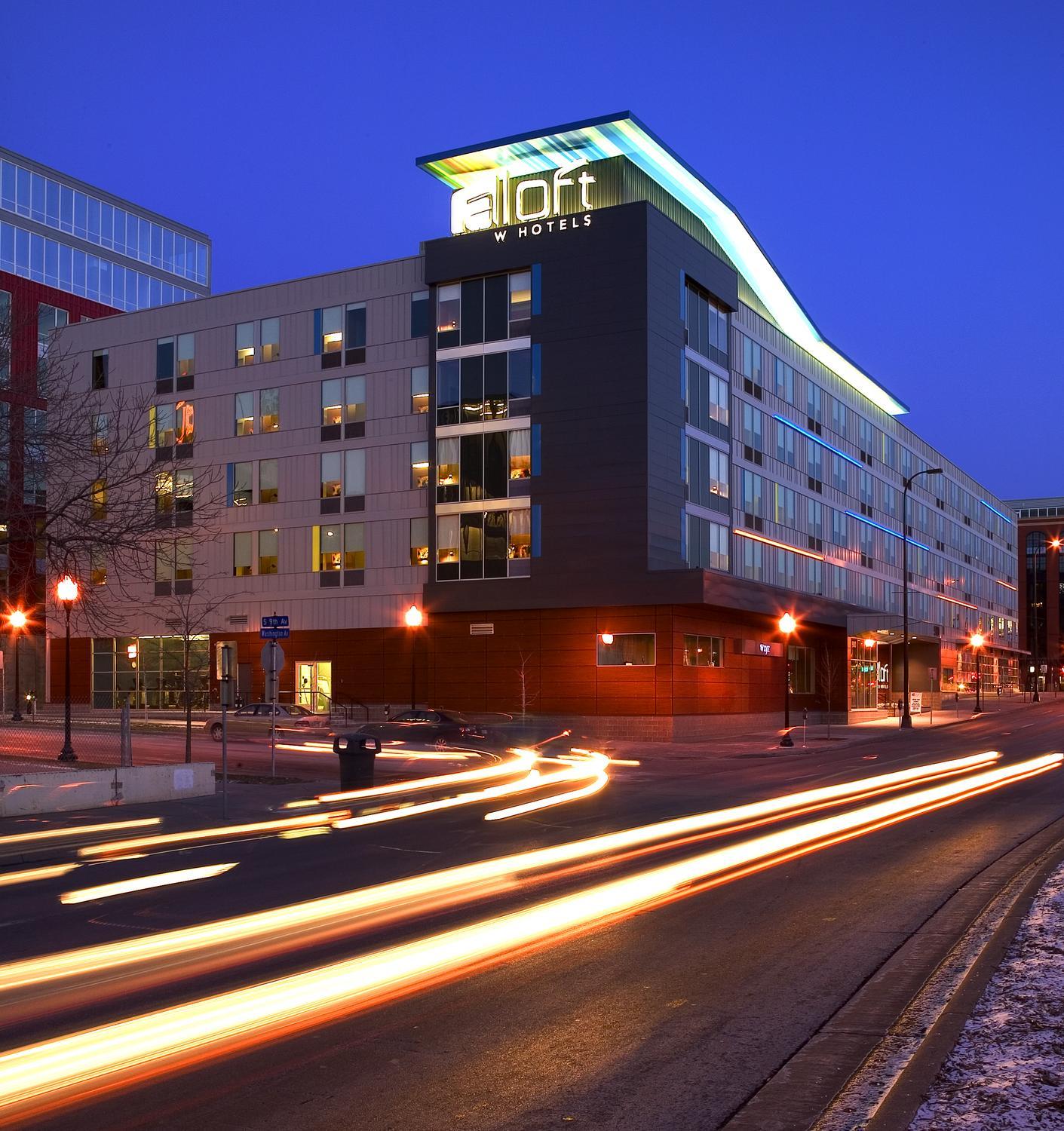 Nighttime view of the Aloft Hotel in Minneapolis, MN