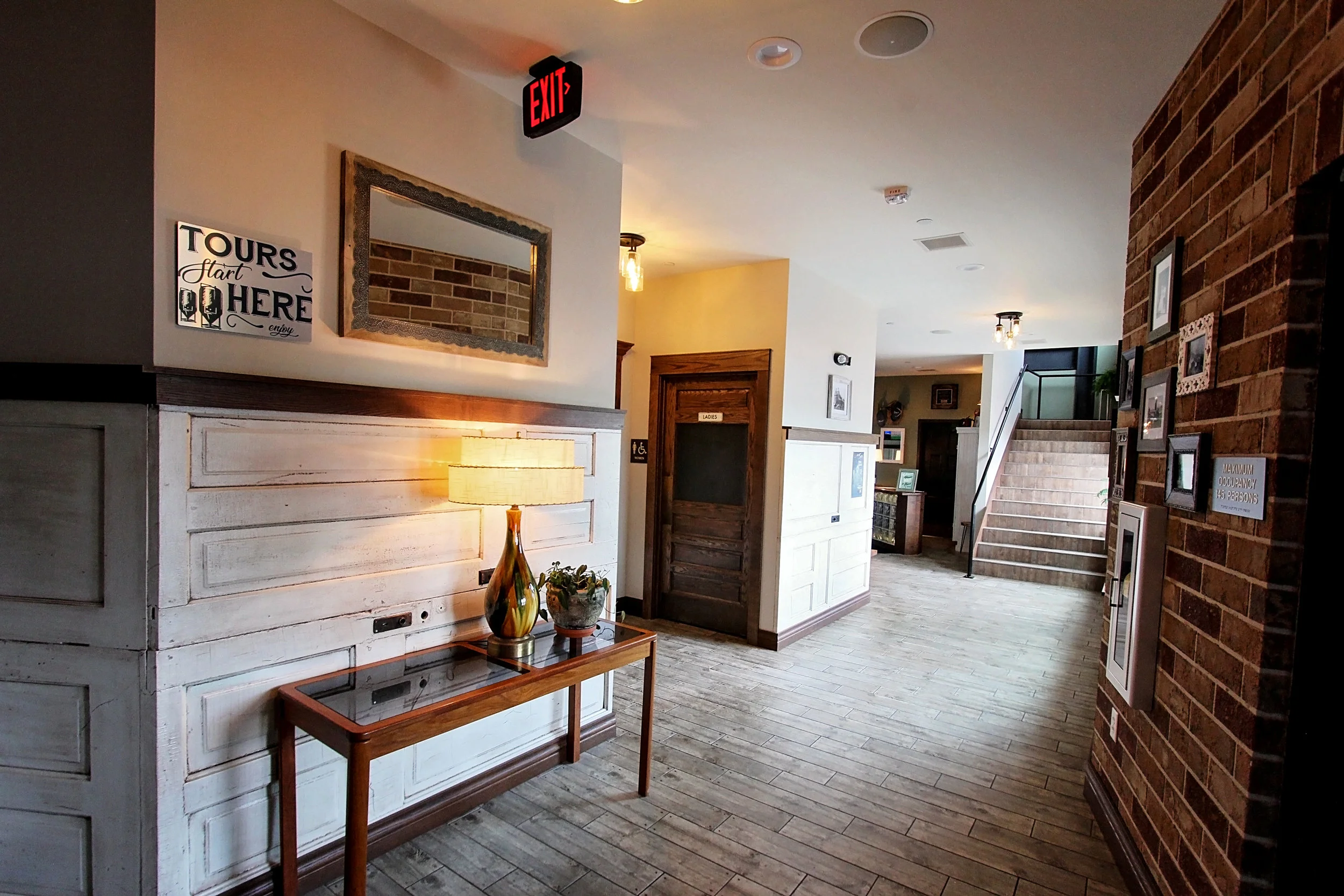 Inside host and restroom area in Vintage Brewery Bar & Restaurant