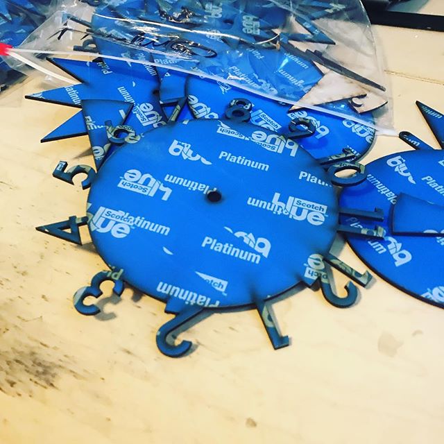 Laser cut clock parts heading towards Albuquerque Museum gift shop!