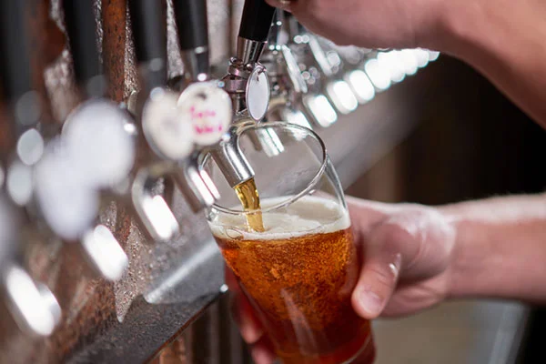 beer dispensing from tap