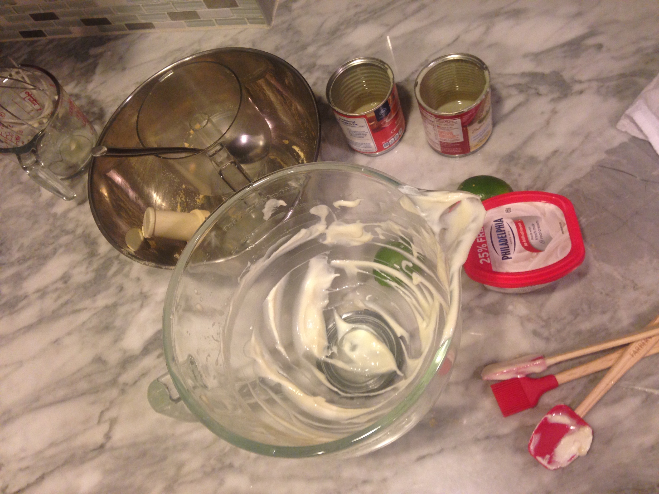 Time to make the filling! All you need is two cans of sweetened condensed milk, 3/4 lime juice, and 1/4 cup cream cheese. Here is what I have learned about lime juice in my experience, it does not matter what kind you use. I have done it all, real key limes from Florida, regular limes from the grocery store, bottled lime juice....and you know what? It does not make a difference, use what you want, it will be delicious.