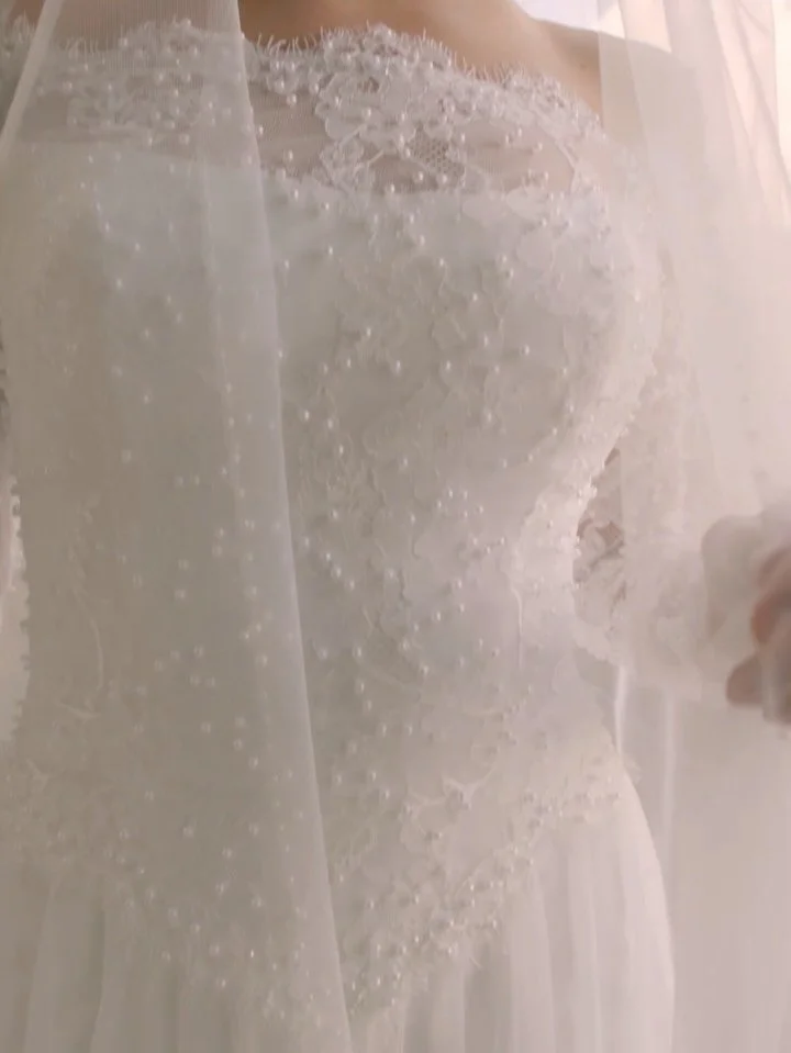 A new designer just dropped at Couture Closet and this is the first romantic addition to arrive. Meet Josie from @sinceritybridal. This soft English net skirt with chantilly lace long sleeve bodice sprinkled with seed pearls is elegant, romantic, and