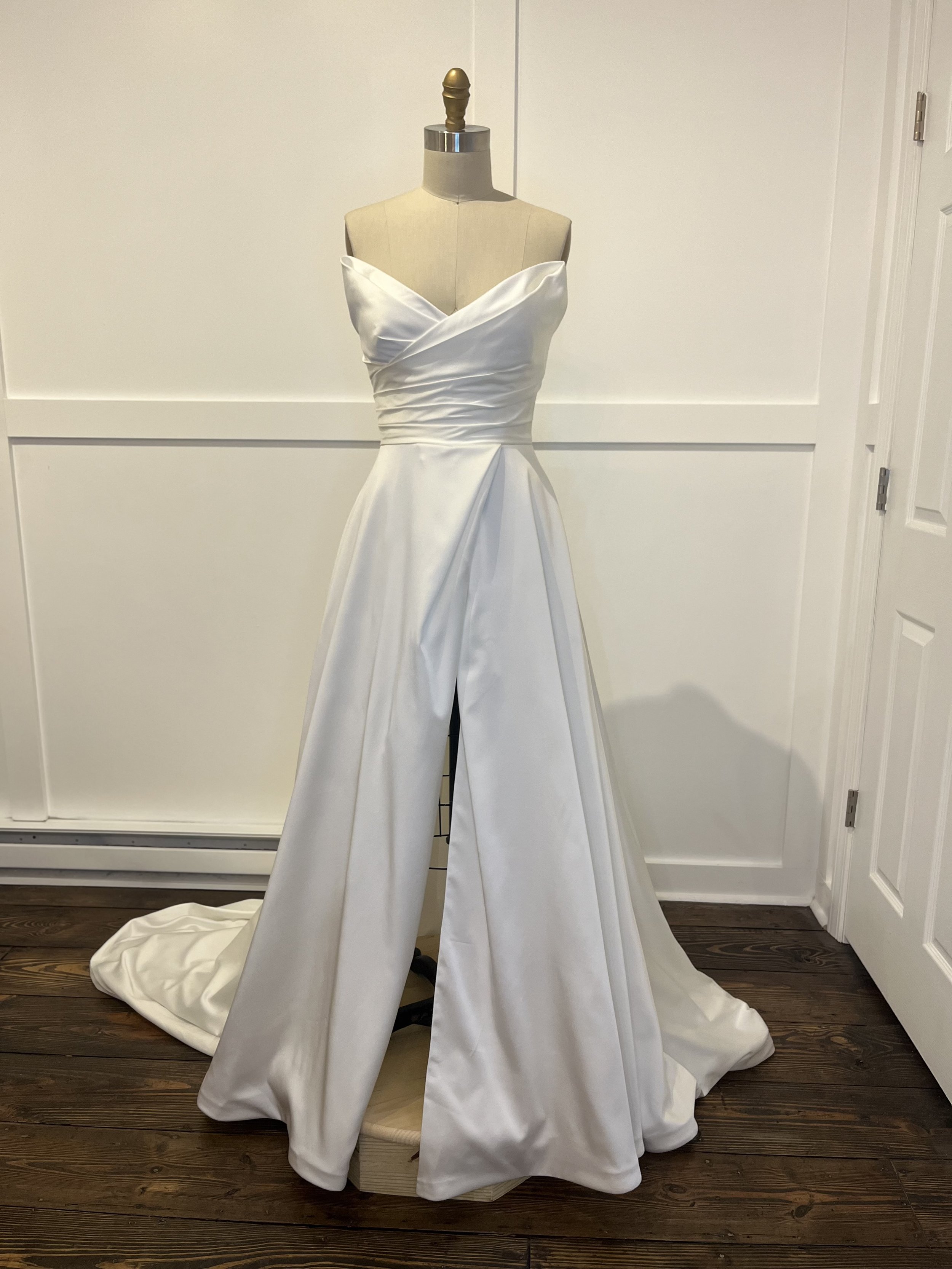 Madi Lane Spencer wedding gown with skirt slit