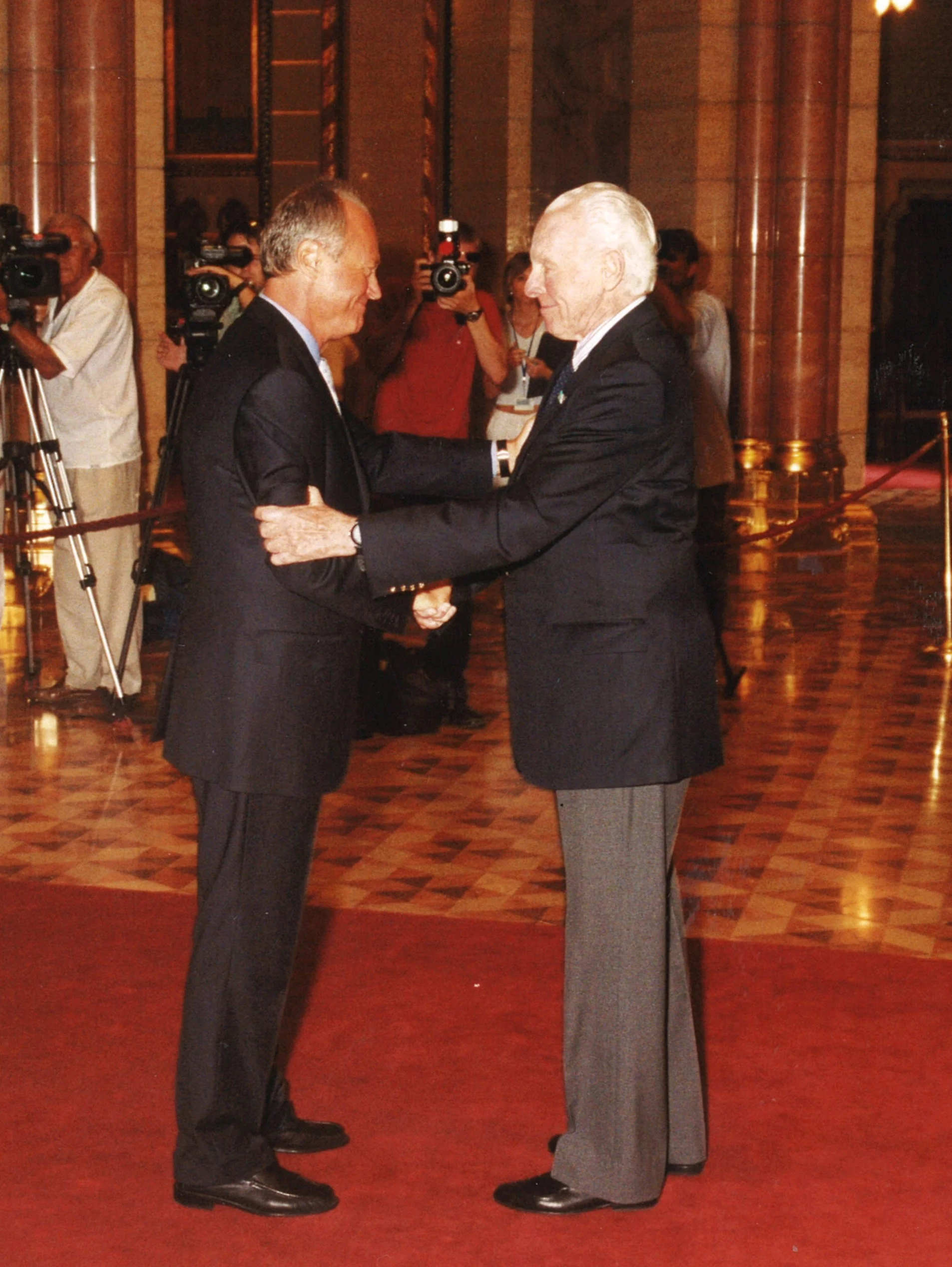 C ongressman Tom Lantos receiving Hungary's Grand Cross in Hungarian Parliament.