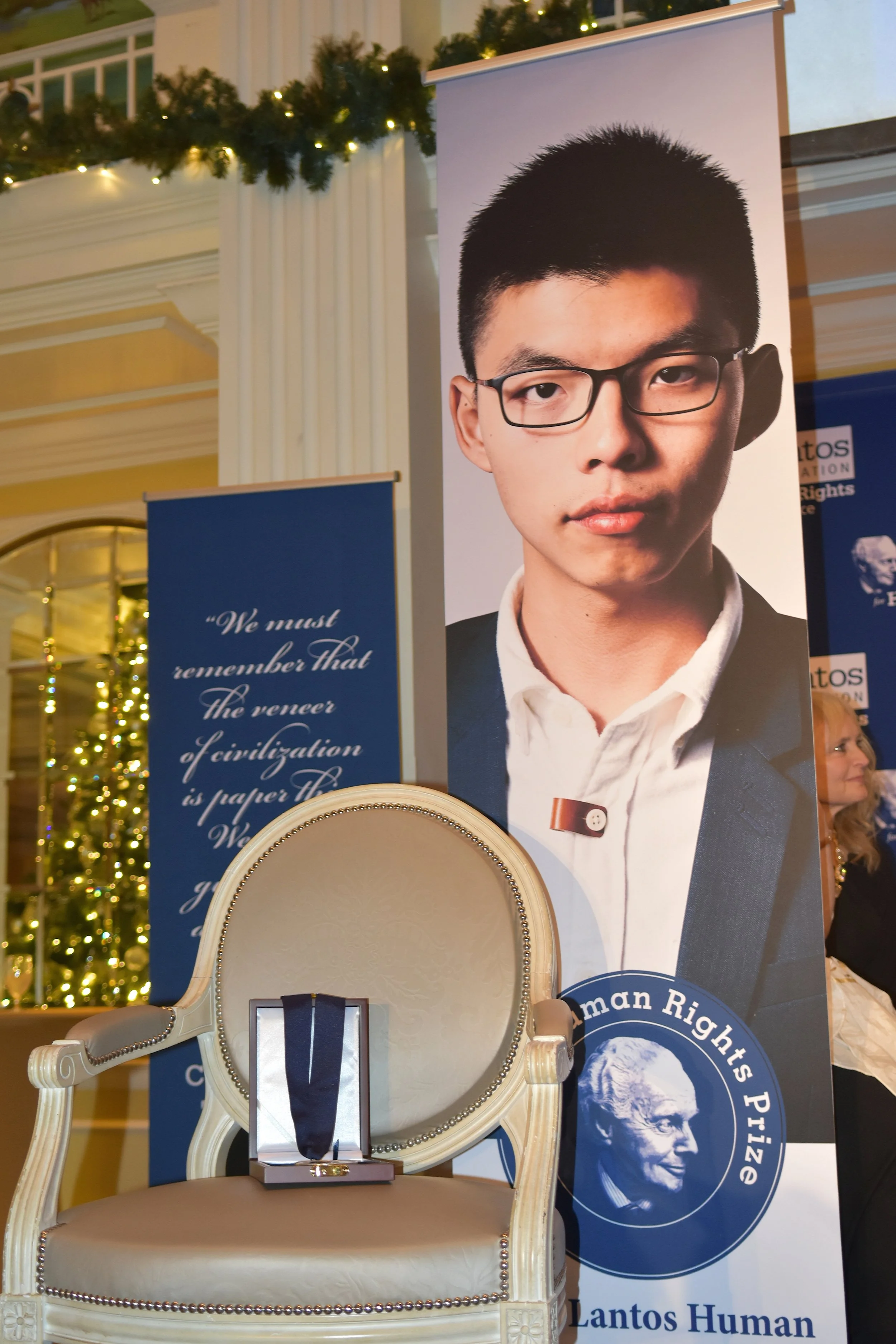Joshua Wong’s chair sits empty at the 2018 Lantos Human Rights Prize Ceremony.