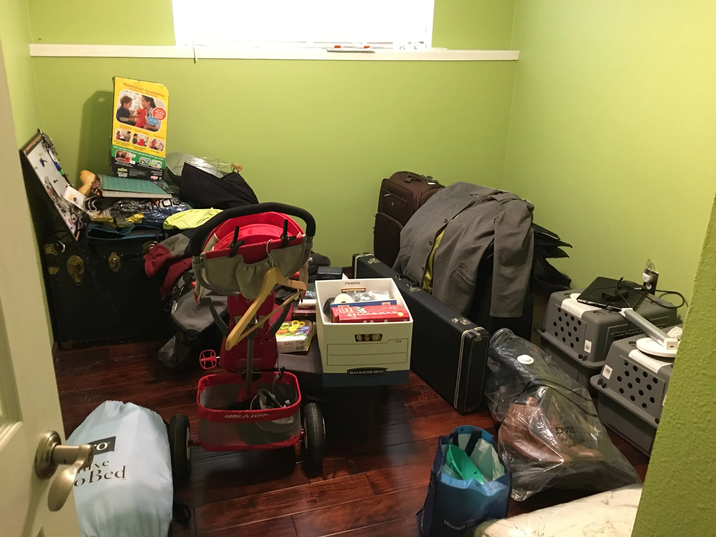 This is what a room that represents about 80% of your remaining possessions looks like prior to getting crated for shipping overseas. Except the aerobed. It wasn't going with us.