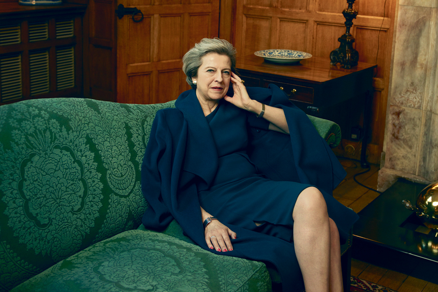 Theresa May, the first British prime minister to be featured in US Vogue, wearing a coat and dress by LK Bennett for an article in the April issue of American Vogue. Photo credits | Portrait photographer @Annie Leibovitz.