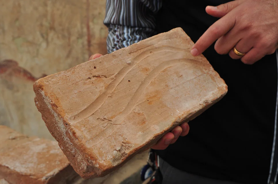 Hands_ManWithBrick_Web_082015.jpg