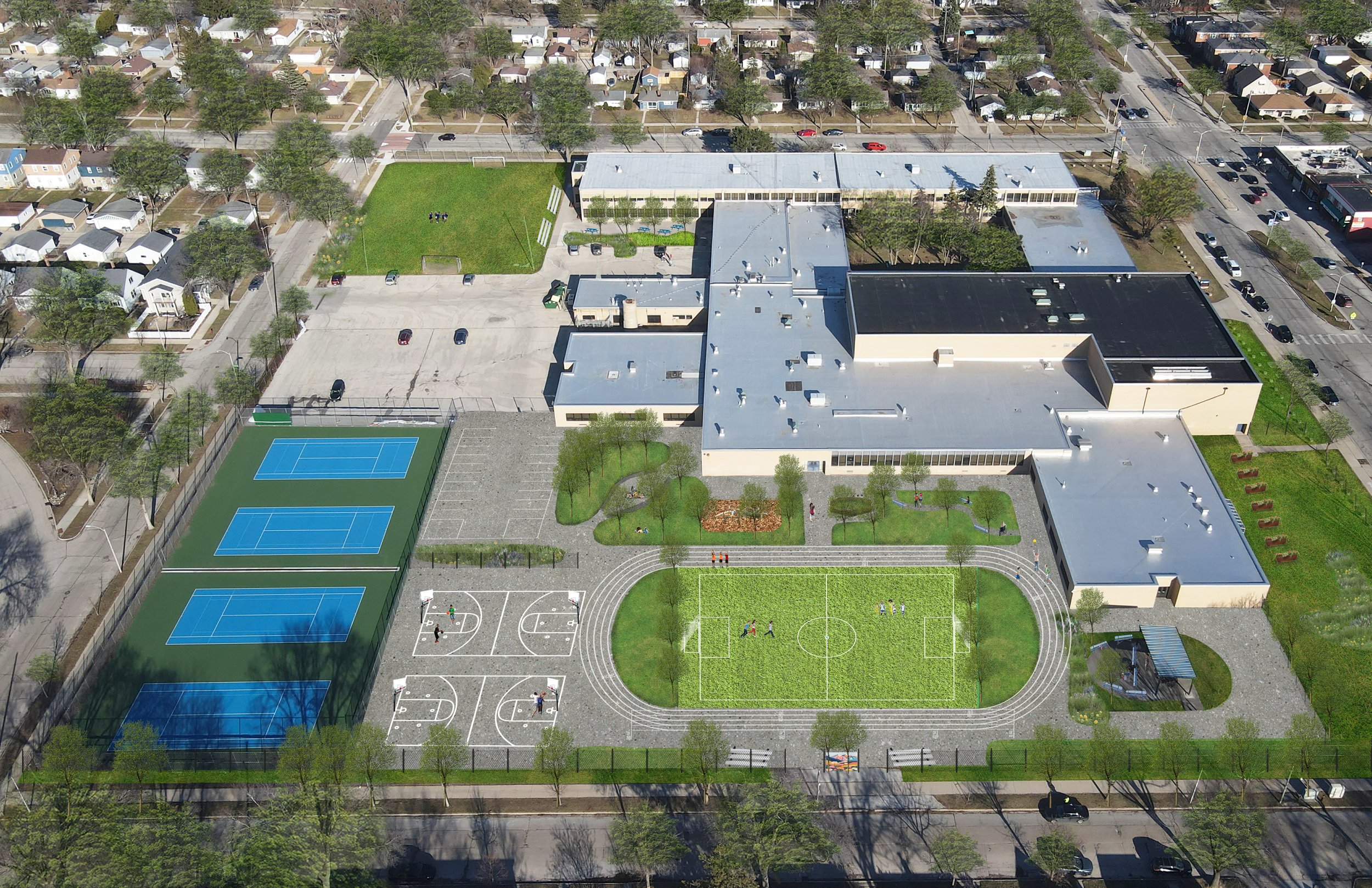 Aerial Perspective showing enhanced outdoor learning spaces, synthetic turf field and track, nature play, trees for shade and stormwater management. 