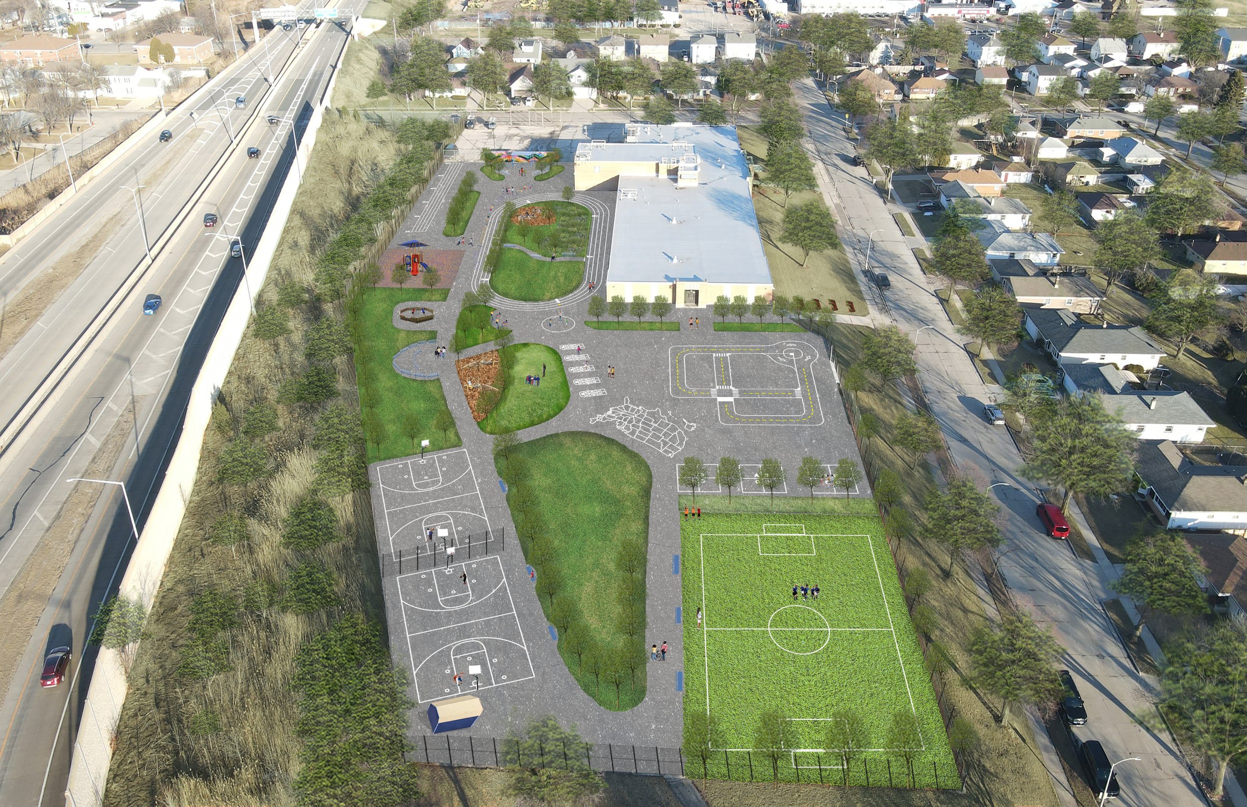Aerial perspective showing enhanced outdoor learning spaces, synthetic turf field and track, nature play, garden beds, trees for shade and stormwater management.