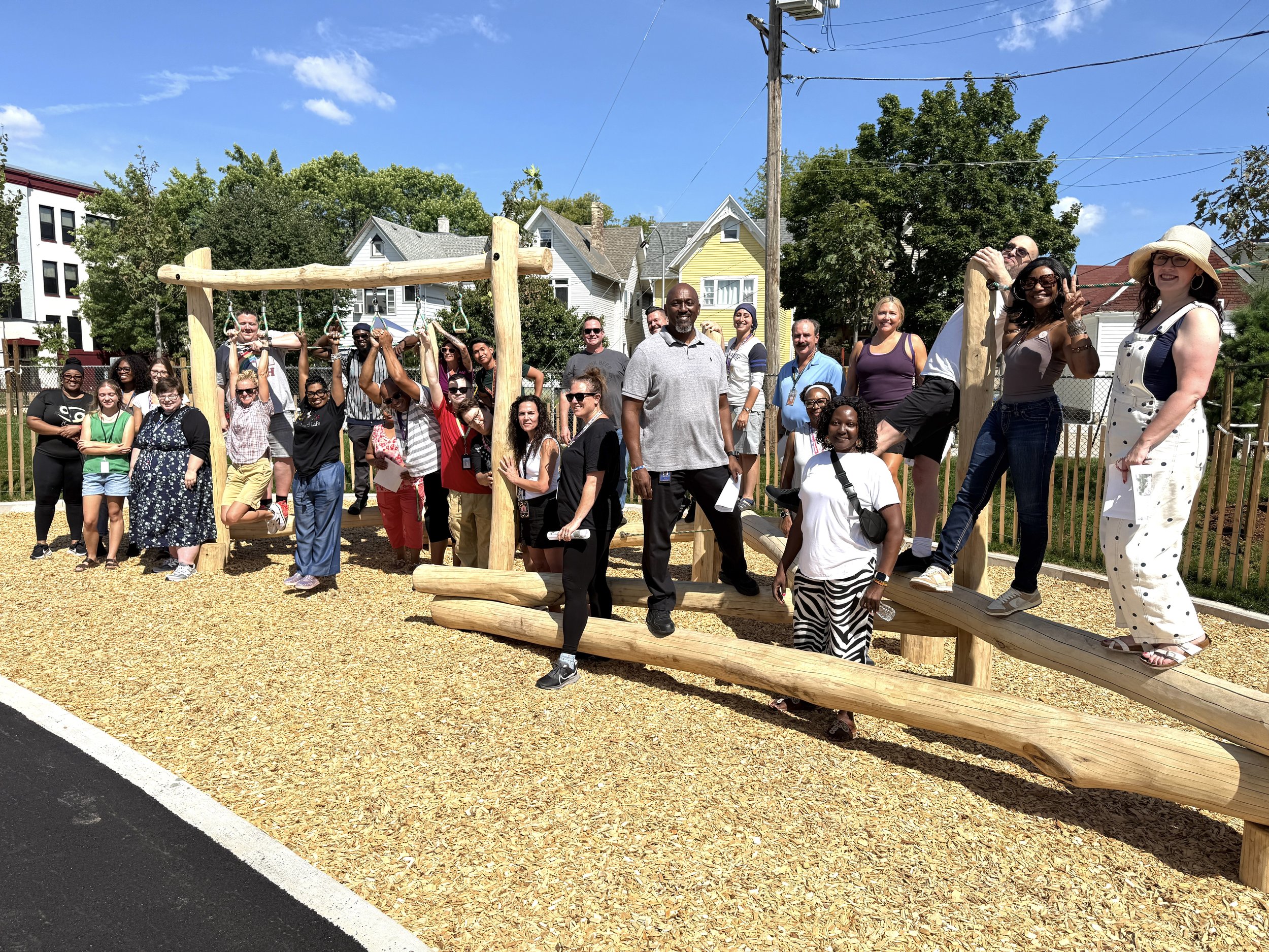  Cass School Team on Nature Play elements during a walk through before school started to get familiar with the new schoolyard 