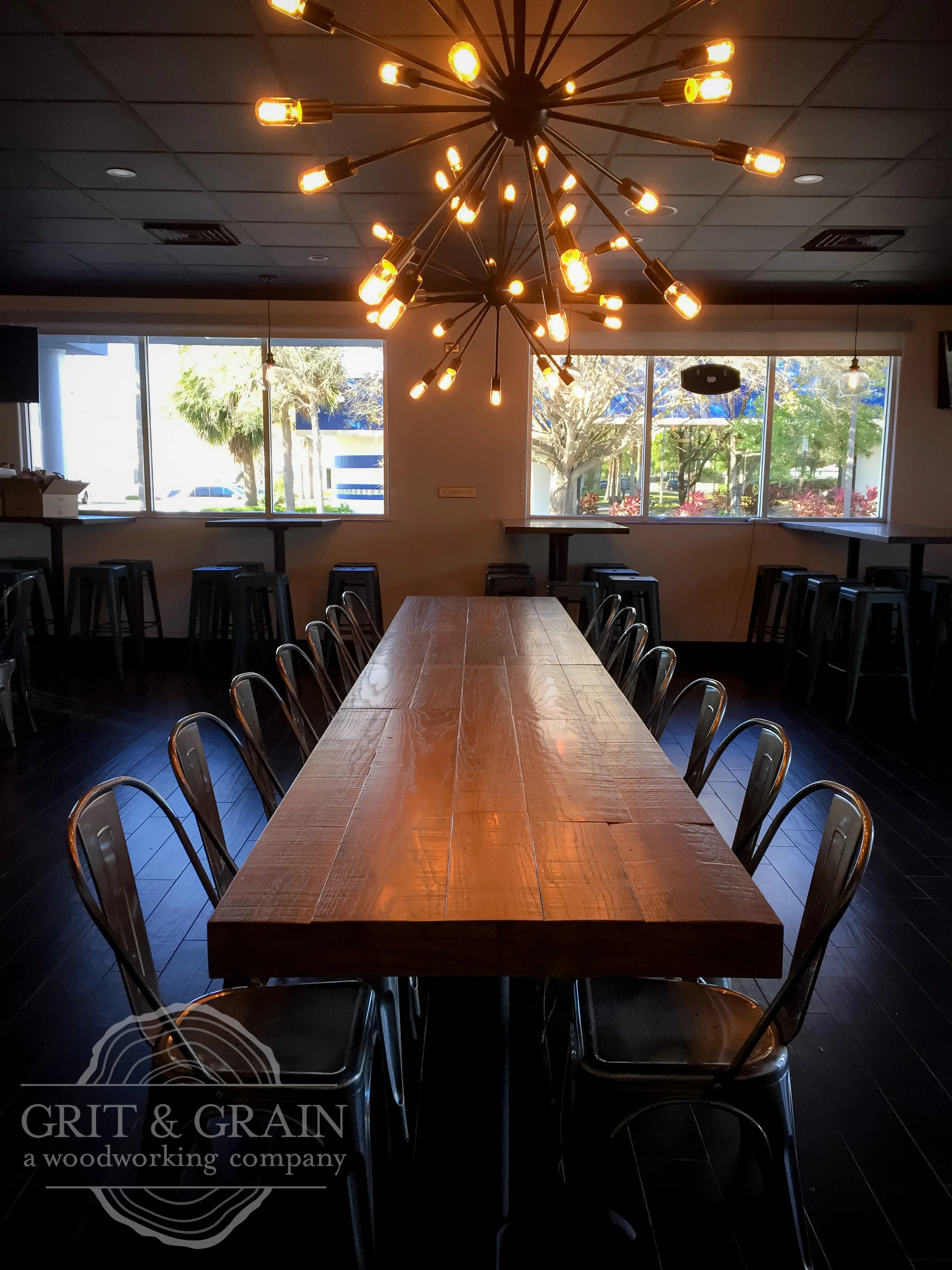 Rustic red oak restaurant table with a weathered finish. Loudmouth Burgers, Orlando