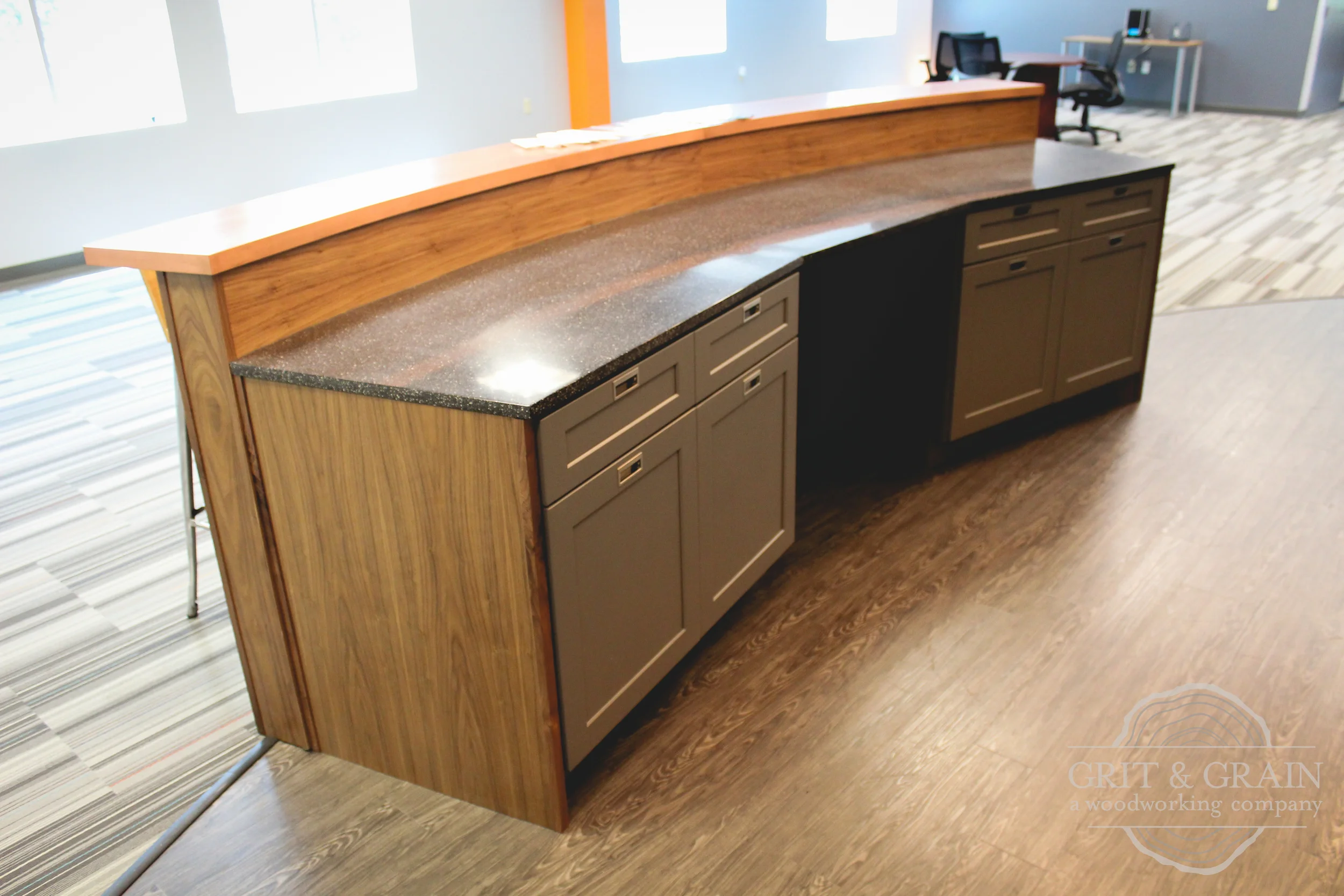 Custom office kitchen bar with a copper countertop and walnut base, ZNES Group office suite, Lake Mary, FL