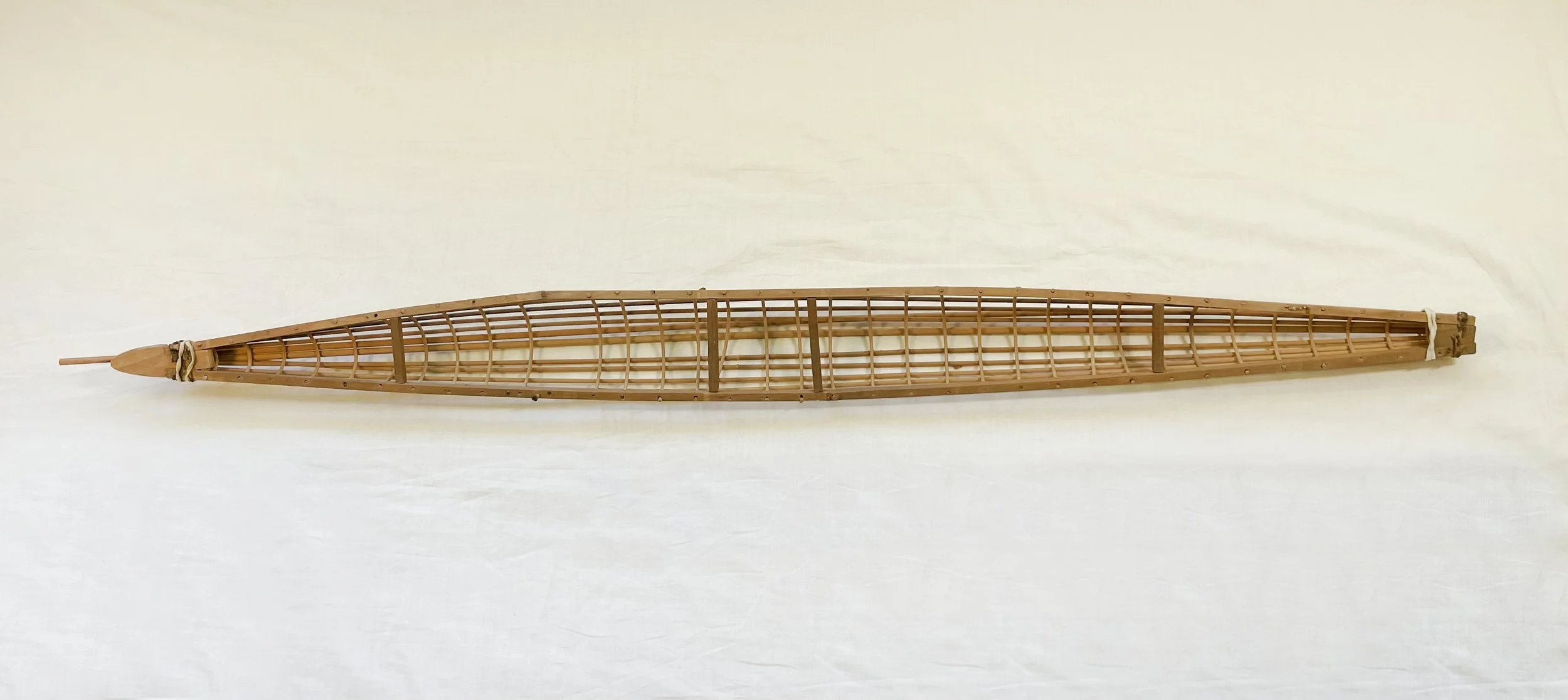 Traditional bidarka skeleton, (mini model) - Bentwood and gut twine - 1m L  x 8cm W x 5cm H