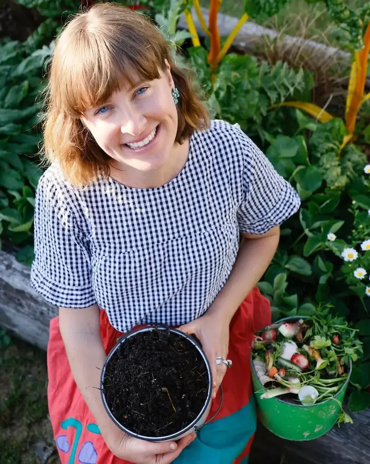Kate Flood headshot with compost by Honey Atkinson