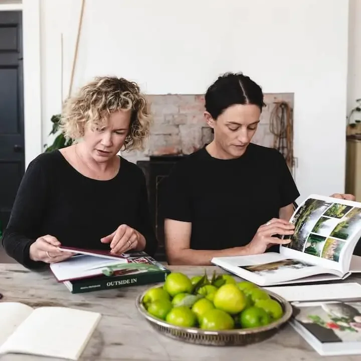 Avant Gardeners, Madeleine Gasparinatos and Emily Allen, researching a podcast episode.