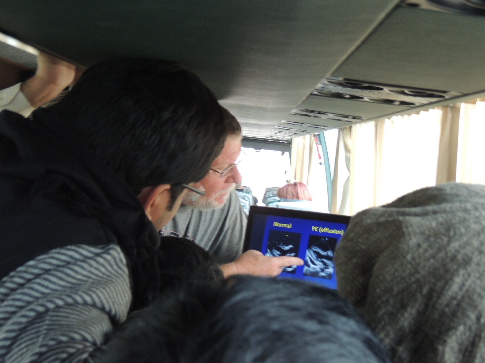David teaching on the bus.JPG