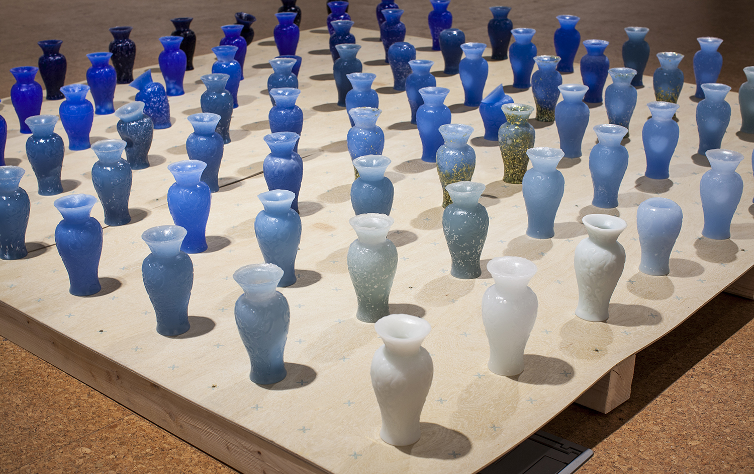 A Search For Virgin Mary Blue  |  wax, wood  |  15" x 96" x 96"  |  2014