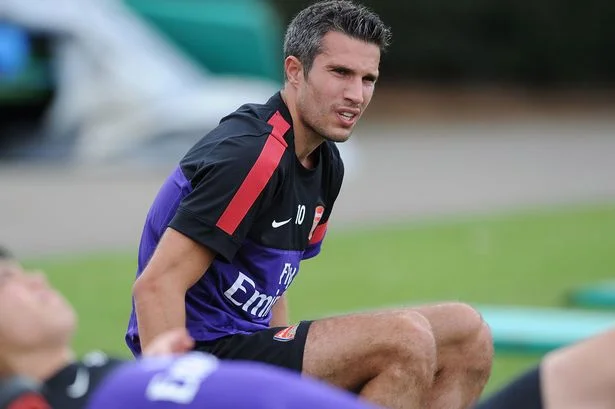 Robin van Persie of Arsenal during a training session at London Colney.jpeg