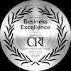 Silver award badge reading Business Excellence with laurel wreath and Consumer Rating Institute in the center.
