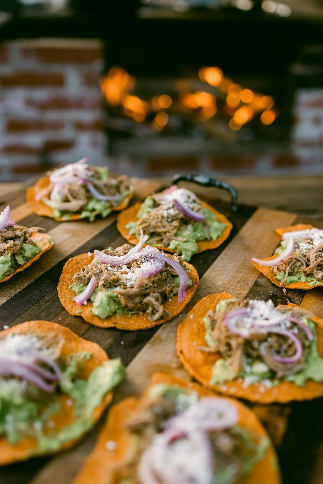 Outdoor garden events are perfect for any occasion, delicious tacos are prepared in the outdoor kitchen for a birthday party.