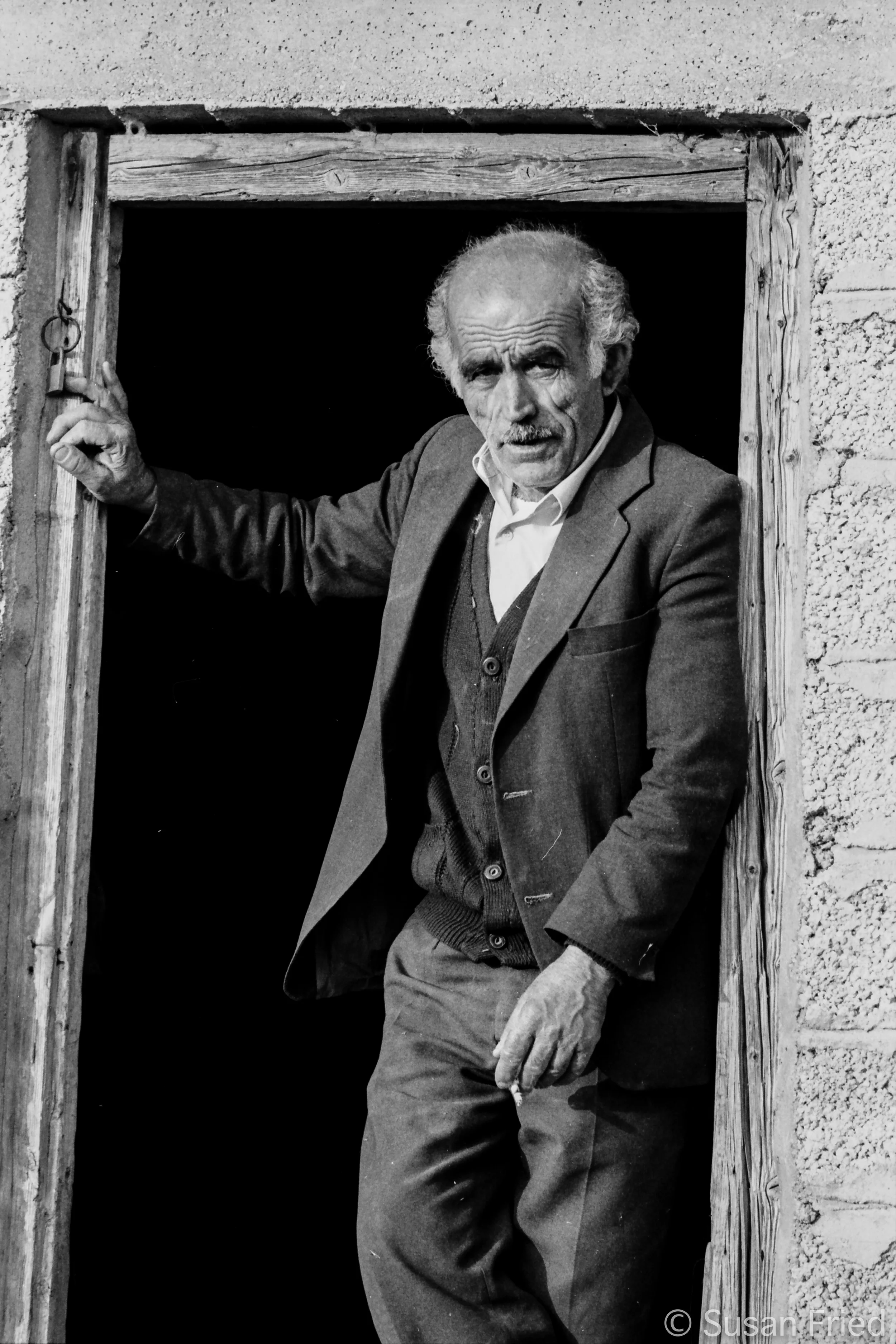 Greek man in Doorway 94?.jpg