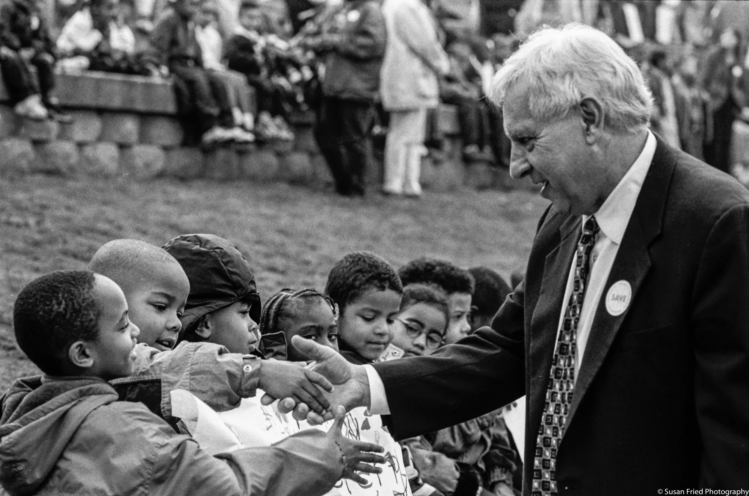 mayor schell shaking hands w- kids.jpg