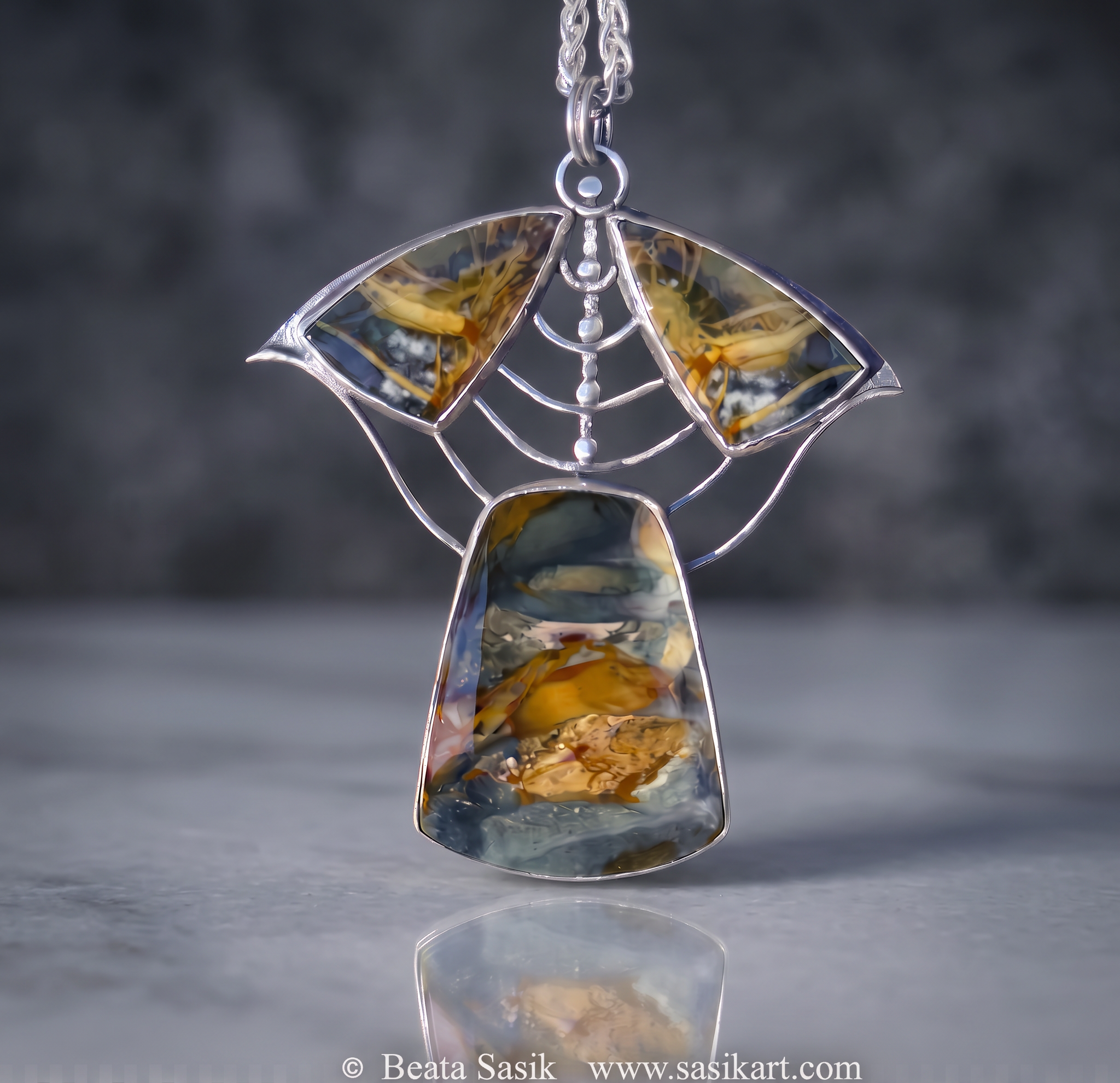 sasik moth pendant.png