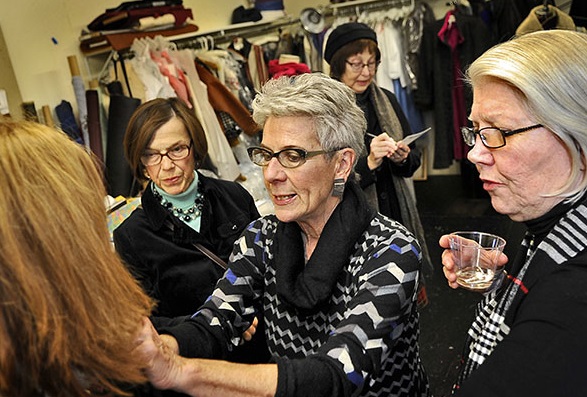 Here are Judy, Catherine, Clare, Ellen and her mom, Carol. All making sure that it fits just right!