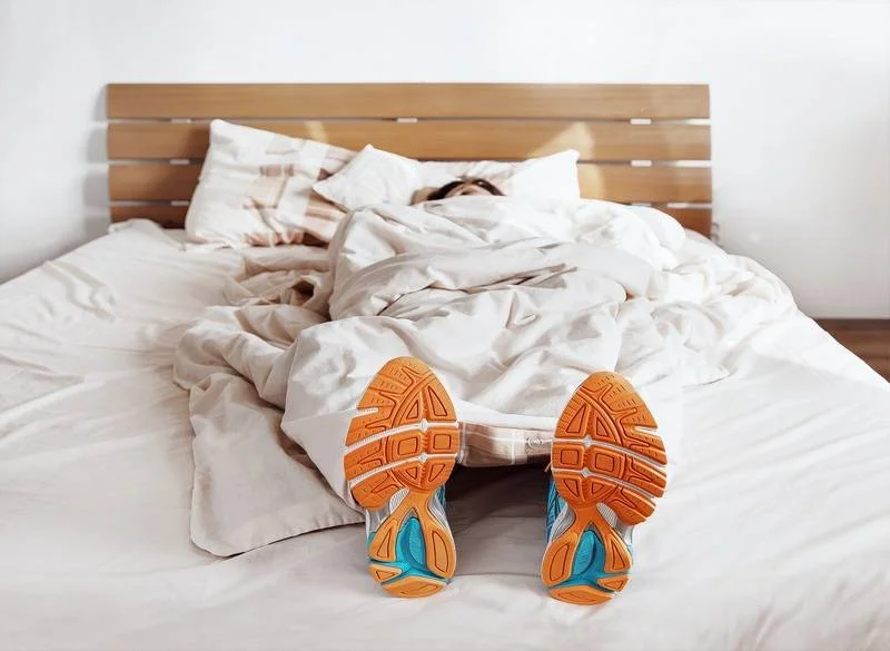 shoes on in bed.jpg