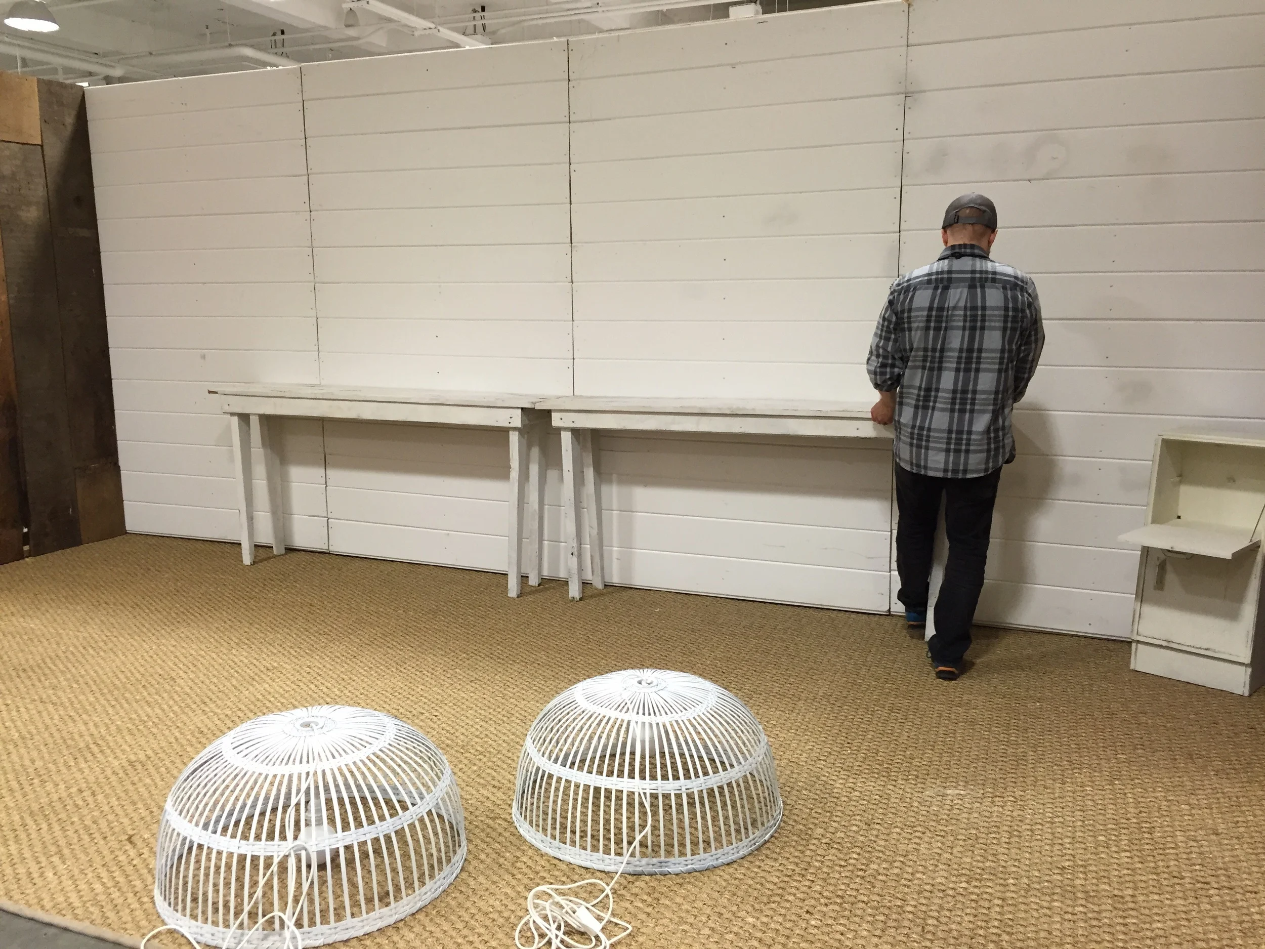 The walls and rug went down and then we start placing all the furniture pieces.