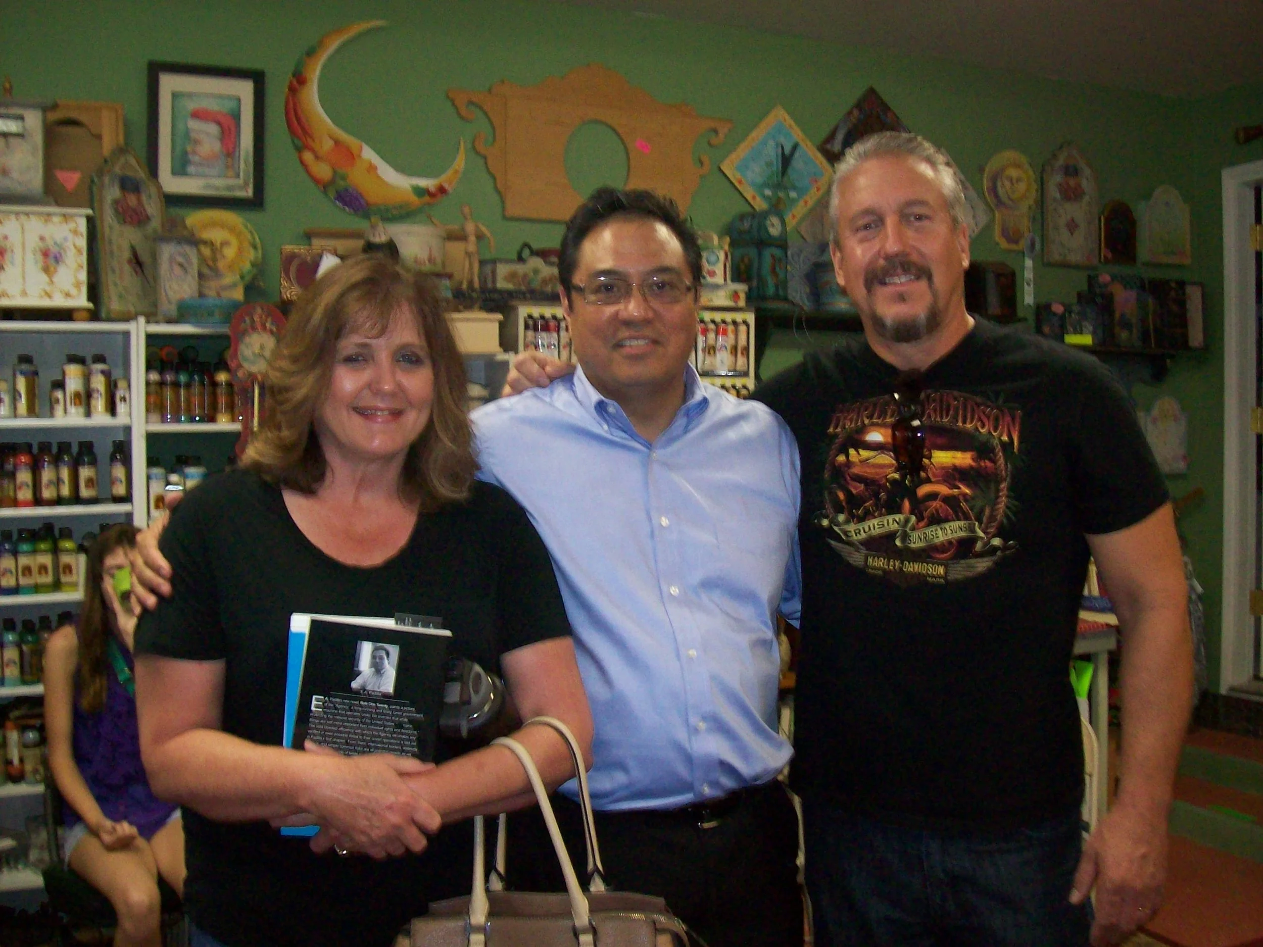 Brian and Debbie Owens with book.JPG