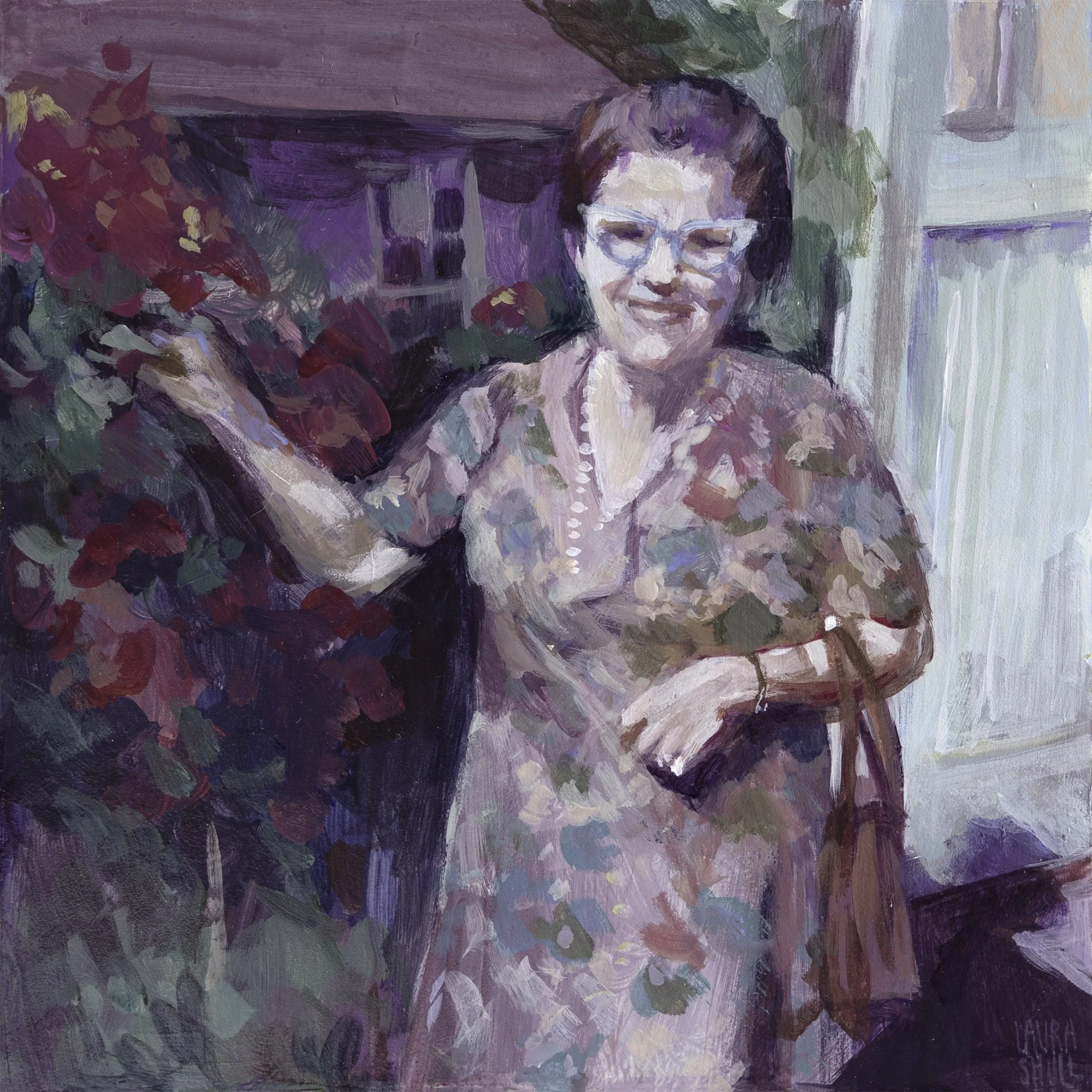 1960s vintage photograph style smiling woman with cat-eye glasses and floral dress stands next to a bright red flowering bush with handbag. Vintage style acrylic portrait by Laura Shull.