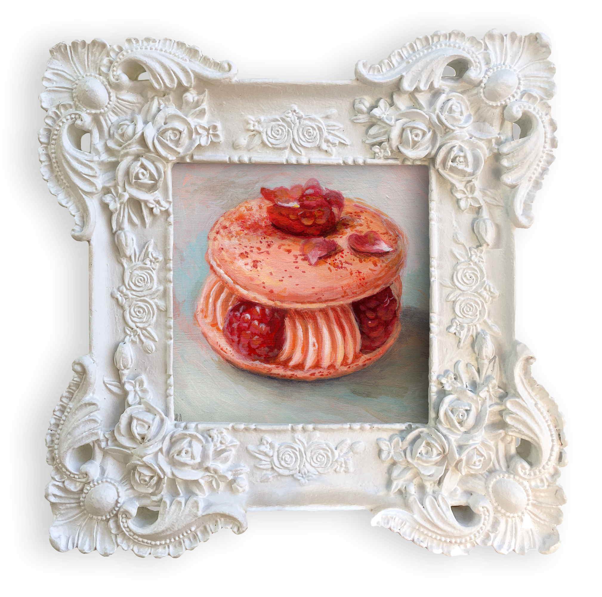 Miniature painting of a pink raspberry macaron housed in an ornate, thick white ornate floral style frame. Fine art oil on board by Laura Shull.