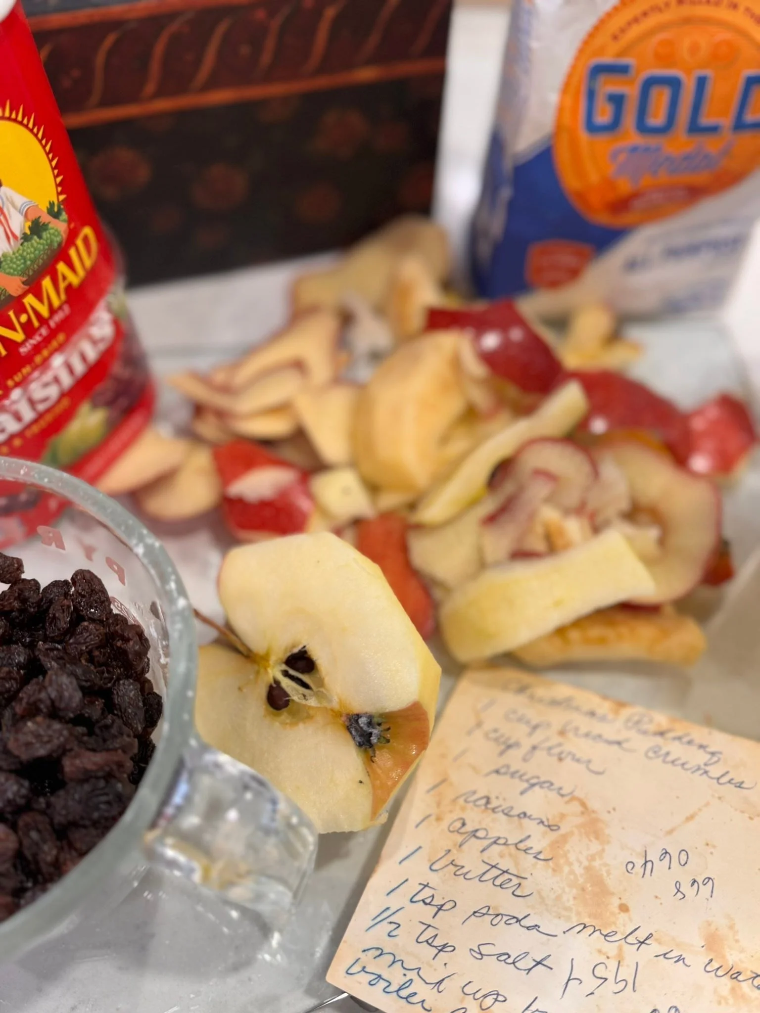 Making the Christmas pudding! I have made for 35 + years but I always take out the scrap of paper my grandmother wrote the recipe on. Just seeing her handwriting brings her close. And our family continues growing! Jack and Santa