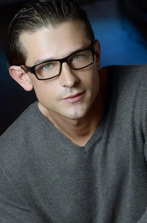 Acting headshot in glasses