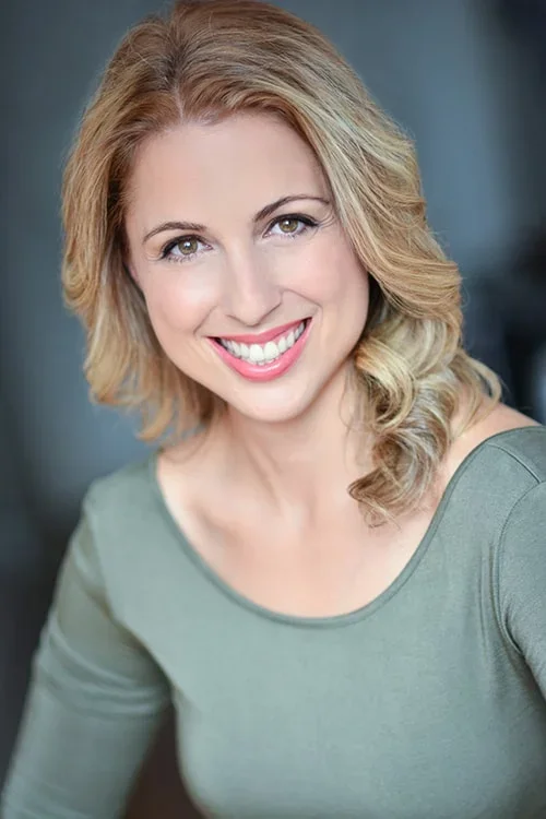 Blonde woman in green