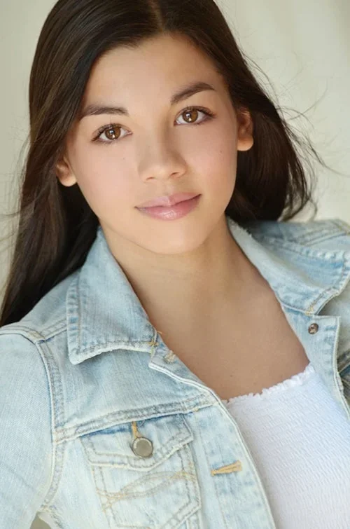 Serious looking teen headshot