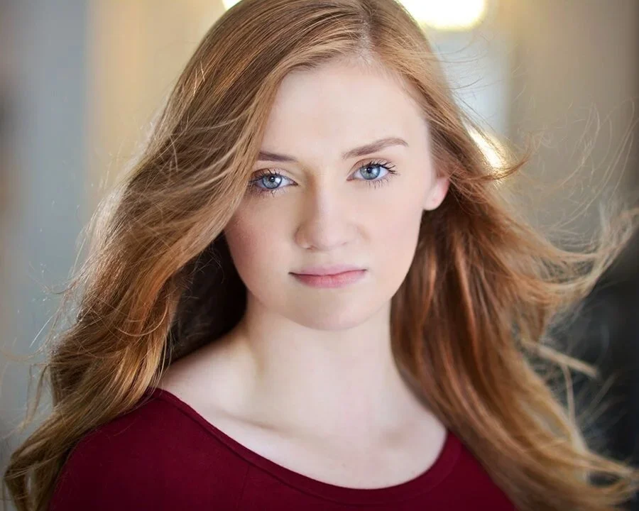 Photo of Young woman redhead