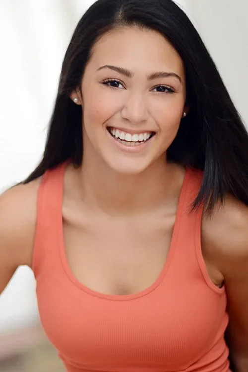 Girl in orange headshot
