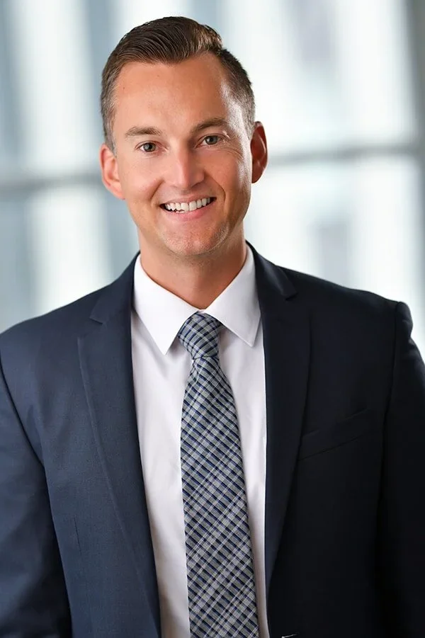 lifestyle portrait of a male in a suit
