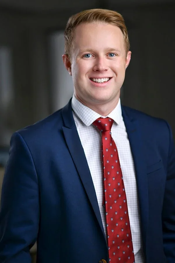 Male in red tie headshot