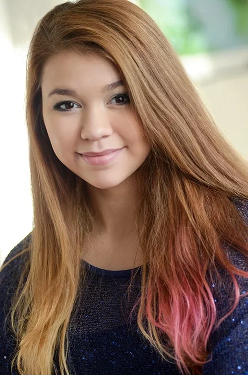 Teen with dyed hair headshot
