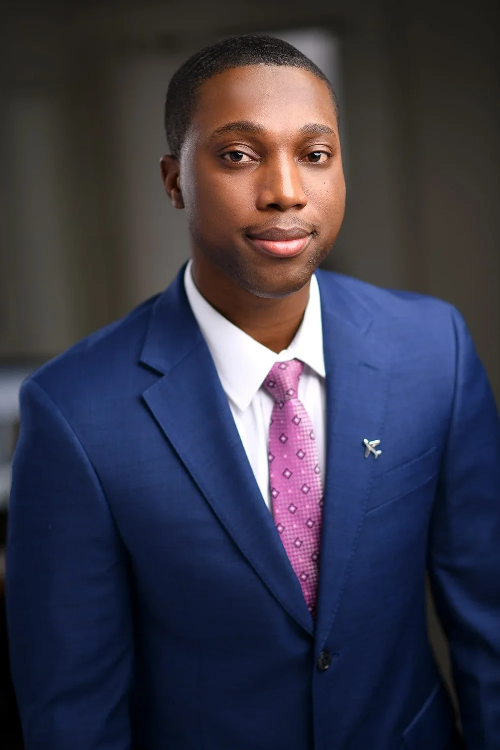 Male executive in pink tie