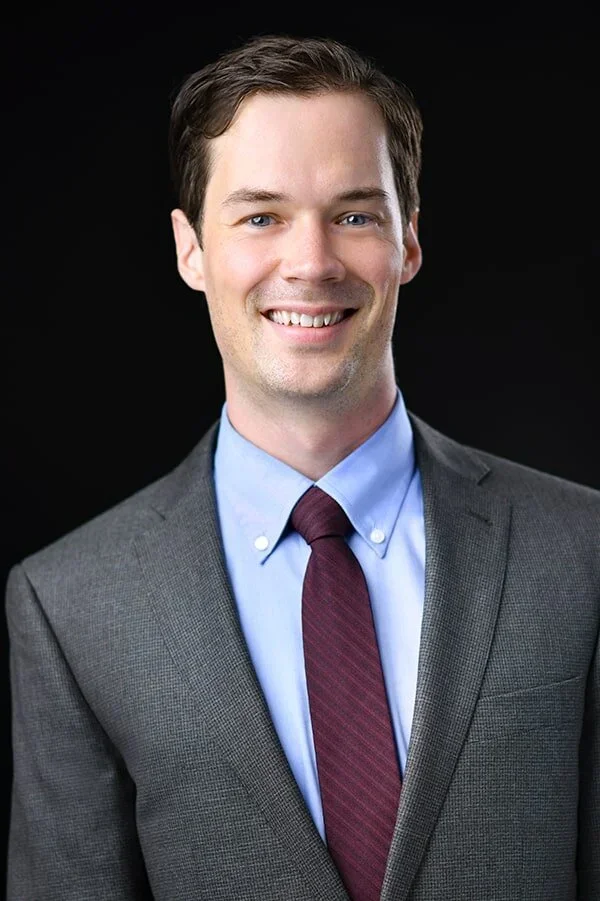 Traditional style headshot of a man